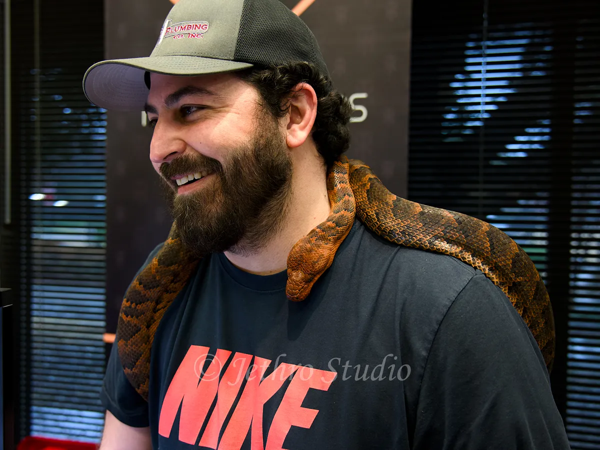 Portrait Of Owner With Dominican Red Mountain Boa